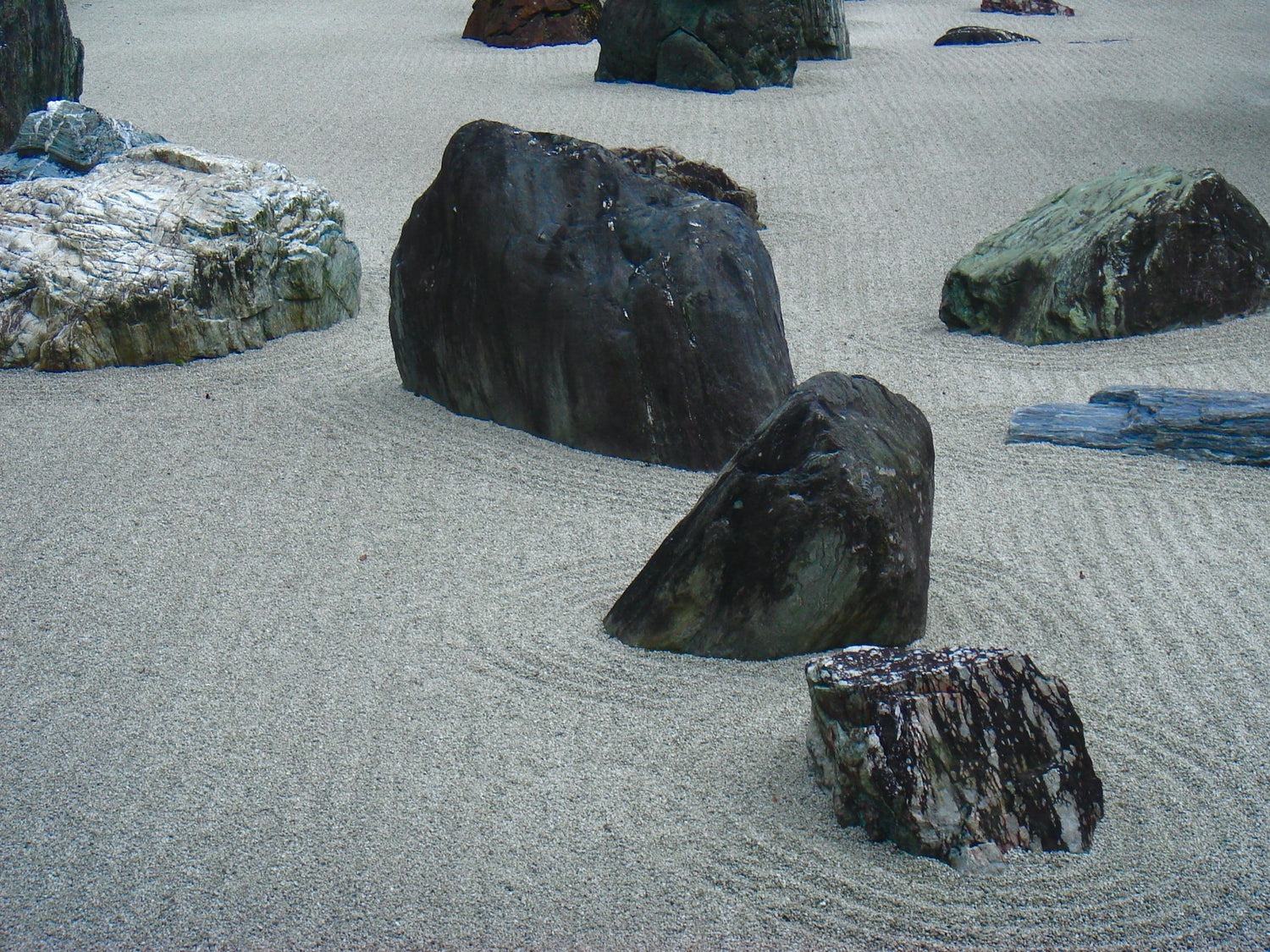 Rocks on raked sand in a Japanese garden