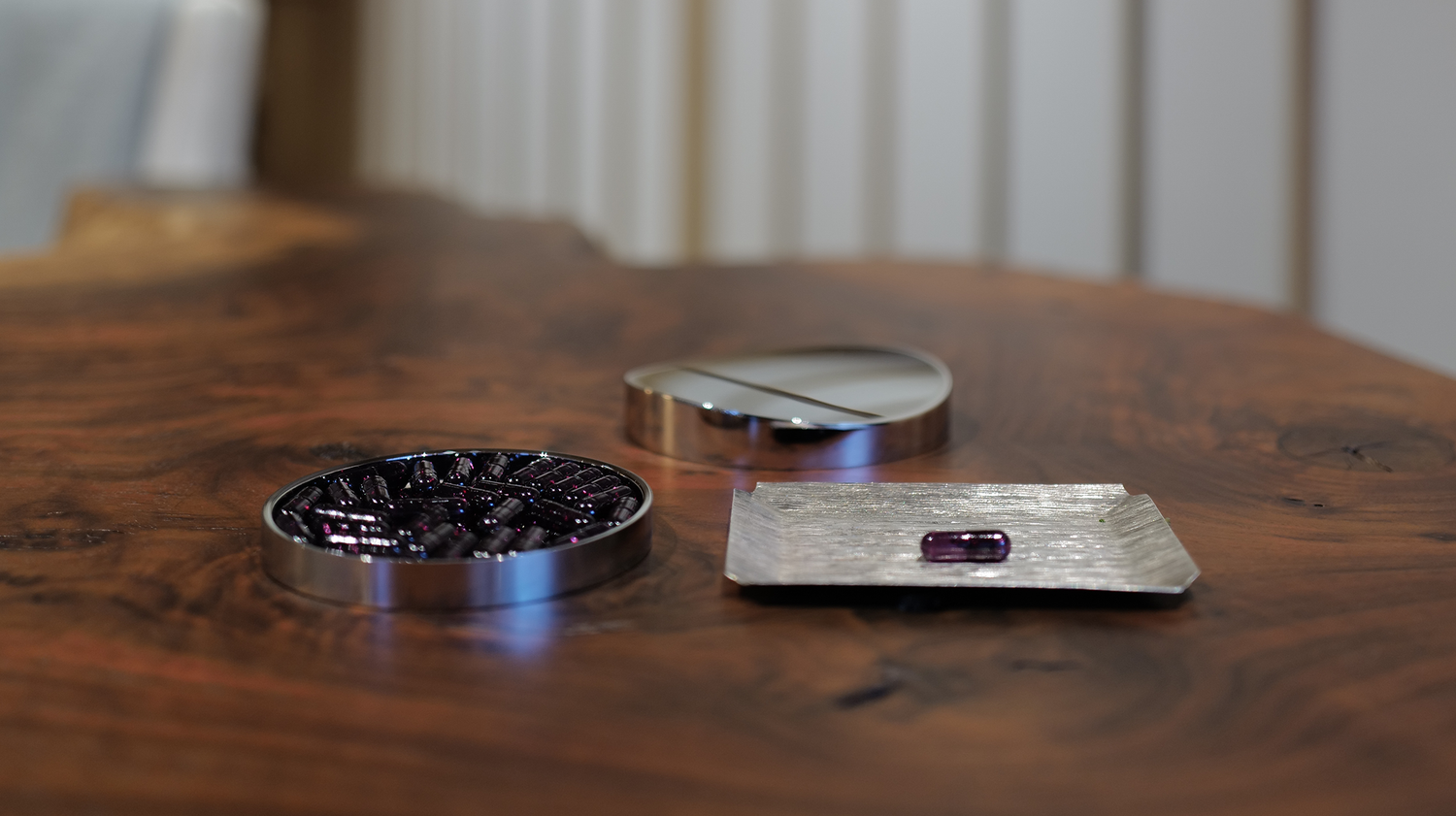 Chiaroscuro, a design object created to elevate the daily vitamin ritual. The open container reveals vitamin D capsules inside.
