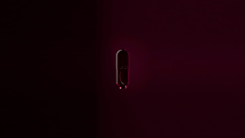 Magenta vitamin D3 and K2 capsule in macadamia oil
